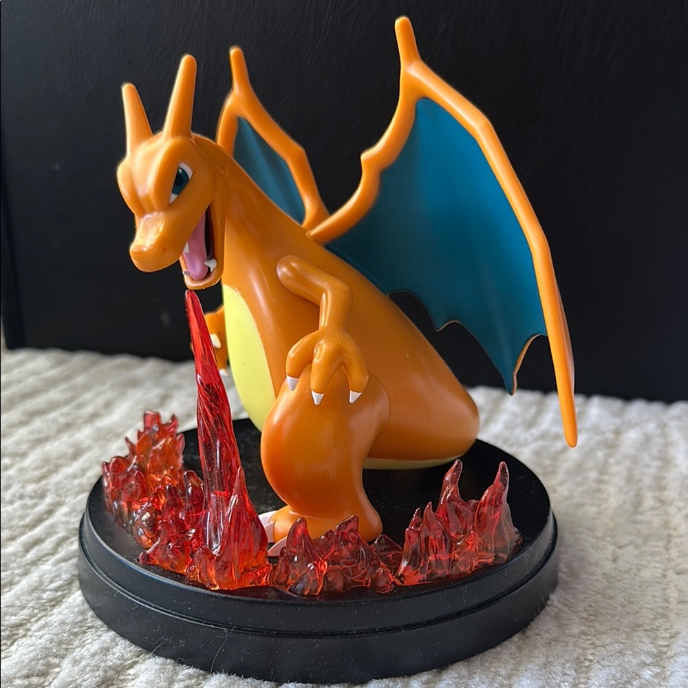 Charizard statue with translucent fire effects
